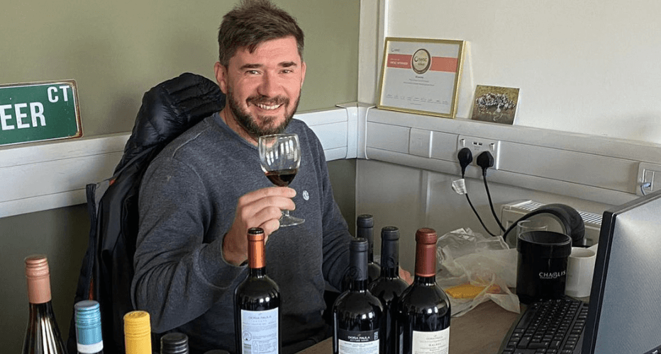 Dafydd Morris tasting a sample of wines